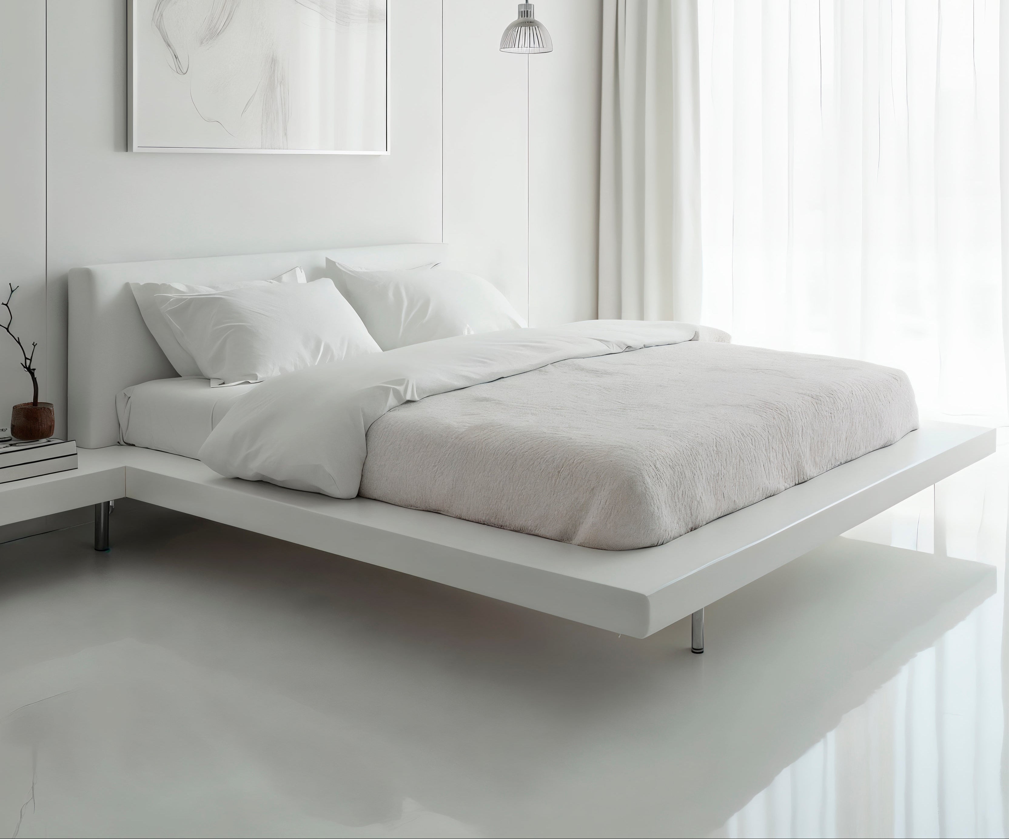 Modern bedroom with a white bed, minimal decor, and light gray flooring.